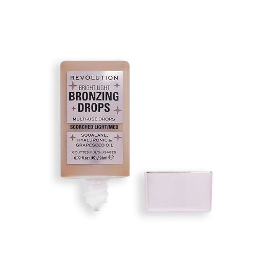 Revolution Bright Light Bronzing Drops Highlighter - XOXO cosmetics