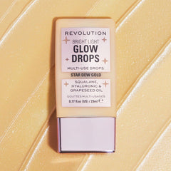 Revolution Bright Light Glow Drops Star Dew Gold Highlighter - XOXO cosmetics